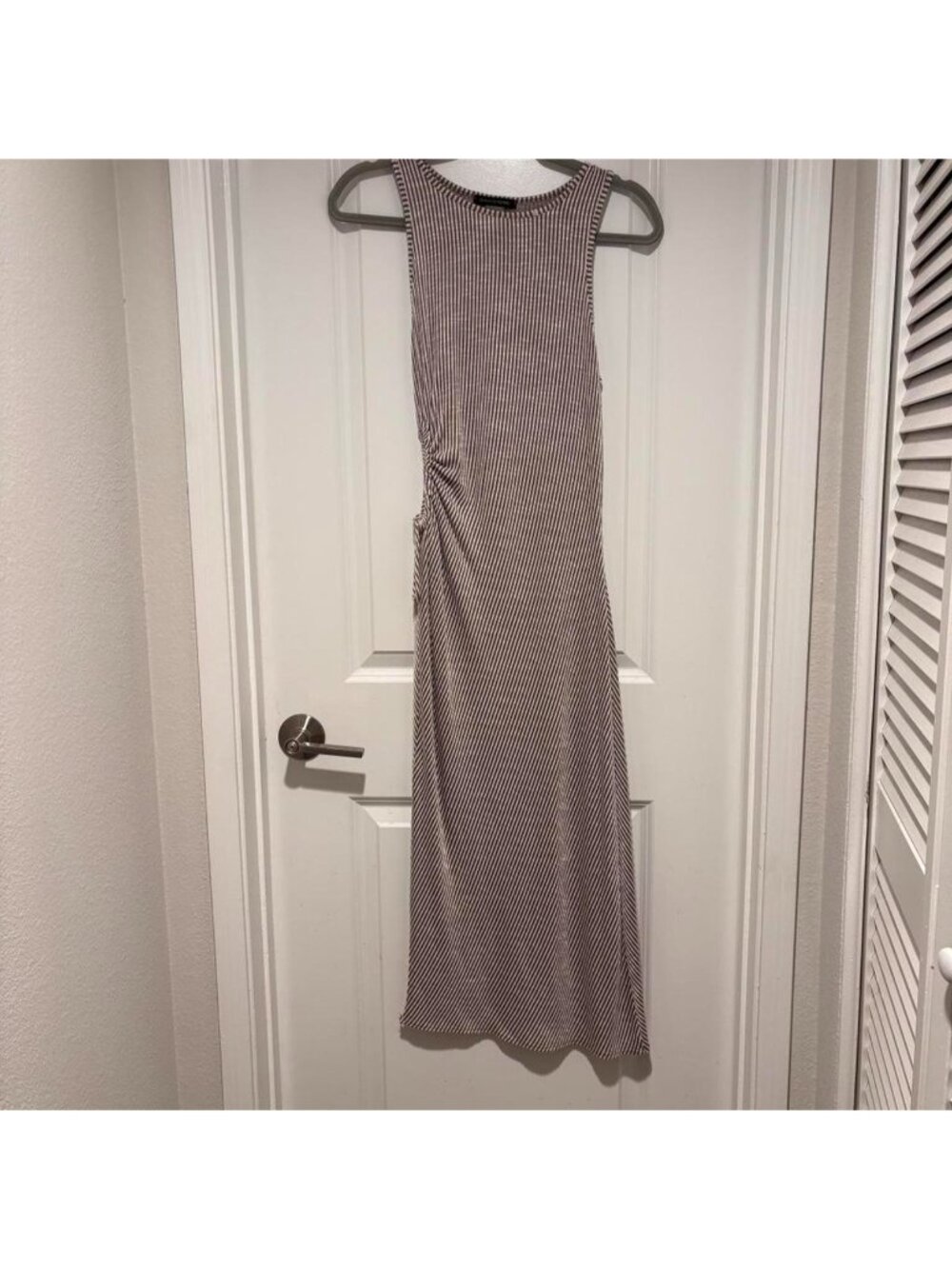 Brown and white striped midi dress with keyhole detail